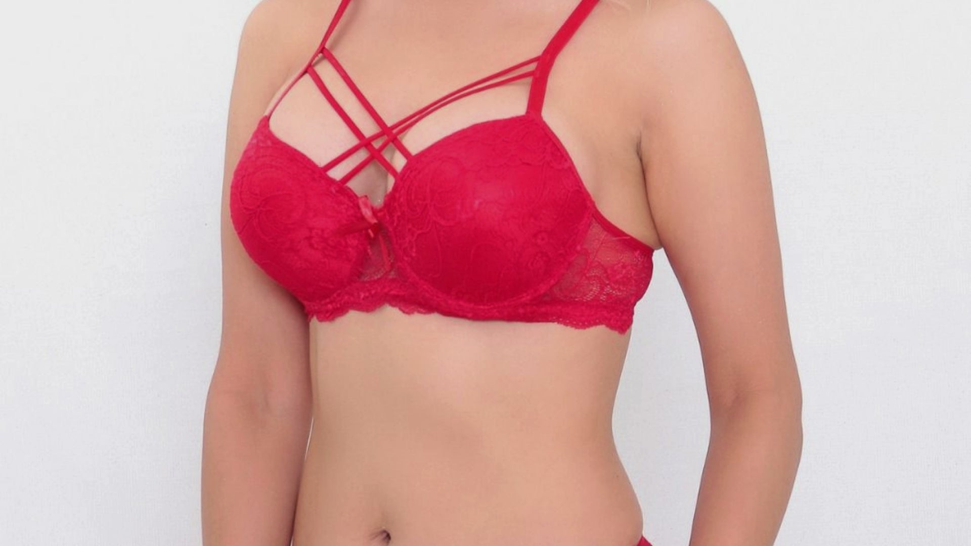 Videoyu yükle: This video showcases a collection of elegant lace embroidered lingerie in various colors, including green, olive, black, fuchsia, pink, red, and white. Each piece highlights delicate lace details and high-quality craftsmanship. Models pose naturally and comfortably to emphasize the texture and design of the lingerie. The background is clean and minimal, allowing the colors and patterns to stand out clearly. The overall mood is sophisticated, feminine, and stylish. The lingerie is suitable for both everyday wear and special occasions. Smooth transitions and close-up shots focus on the intricate lace embroidery throughout the video.